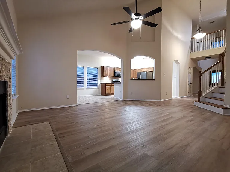 Family room looking toward kitchen and stair