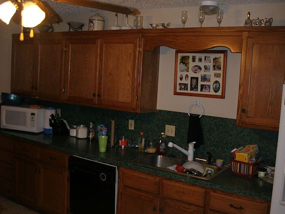 Second view of kitchen.  Behind the camera is stove and more cabinet space.