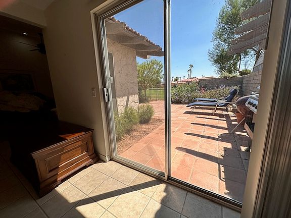 Den slider to the south facing patio.