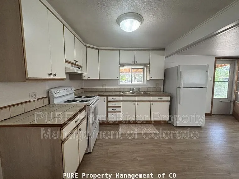 1040 Harlan St — Photo 6