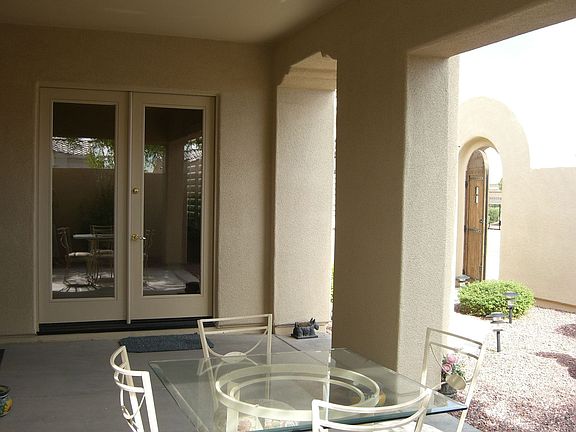 View from Courtyard porch to kitchen french door exit