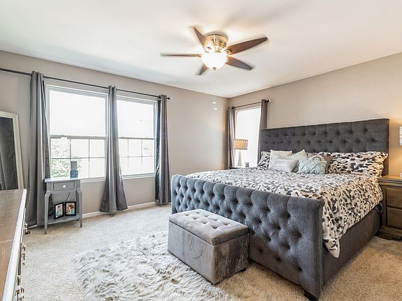 large master bedroom with walk in closet
