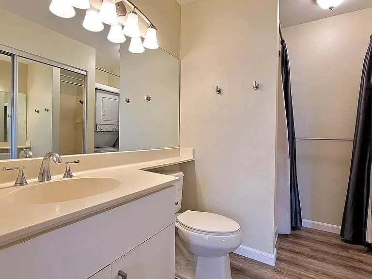 Bathroom with washer/dryer inside the unit