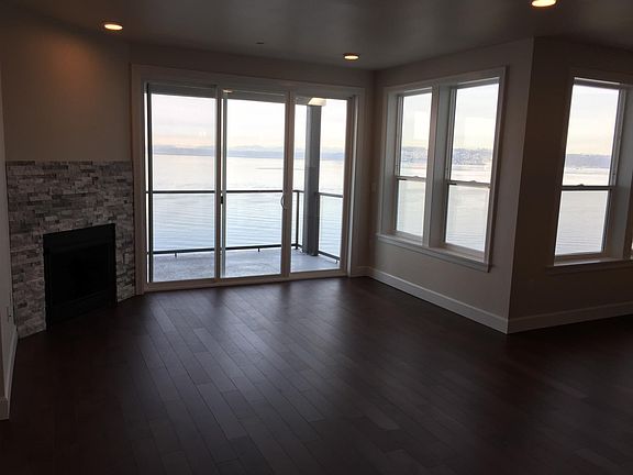 Living room with sliding glass doors to deck