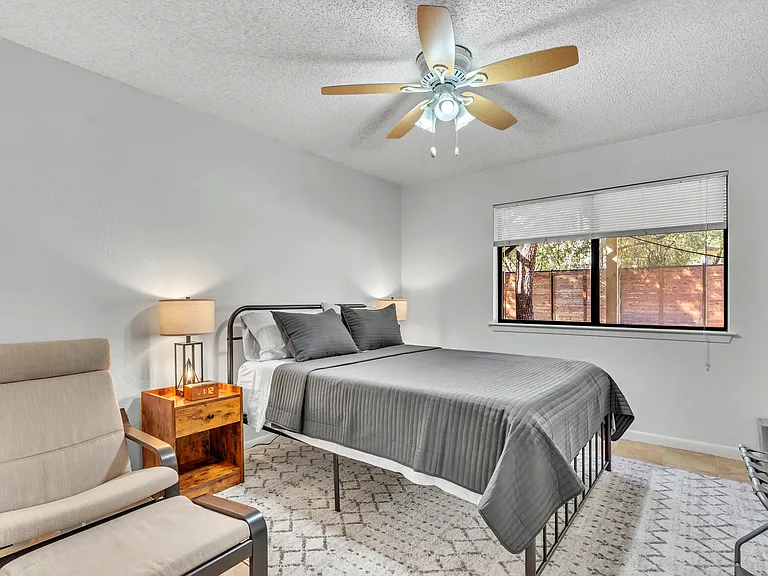 Bedroom 1 with Poang Chair and Ottoman