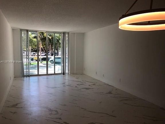 3rd image of 19380 Collins Ave APT 119