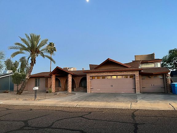 Front of Home, 3 car Garage.