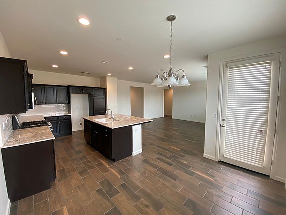 Living Room + Kitchen + Dining Area