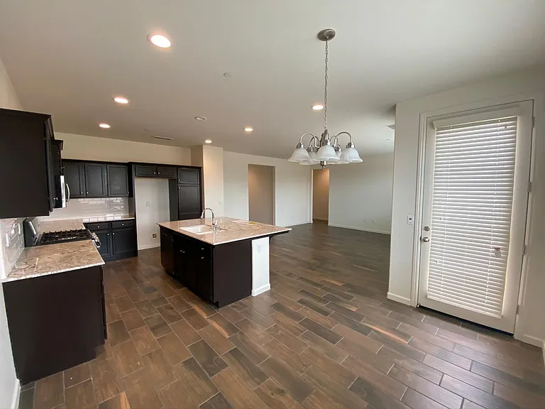 Living Room + Kitchen + Dining Area