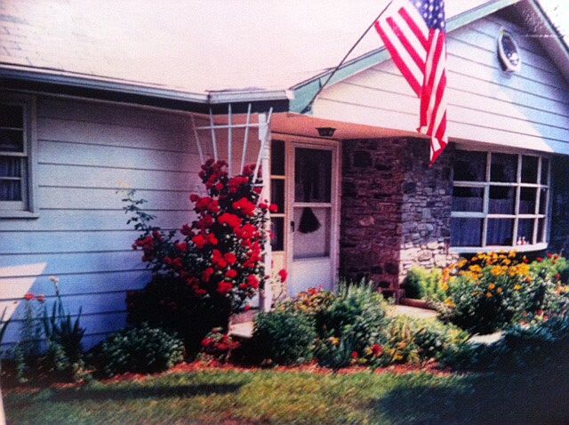 Front of house in summer.