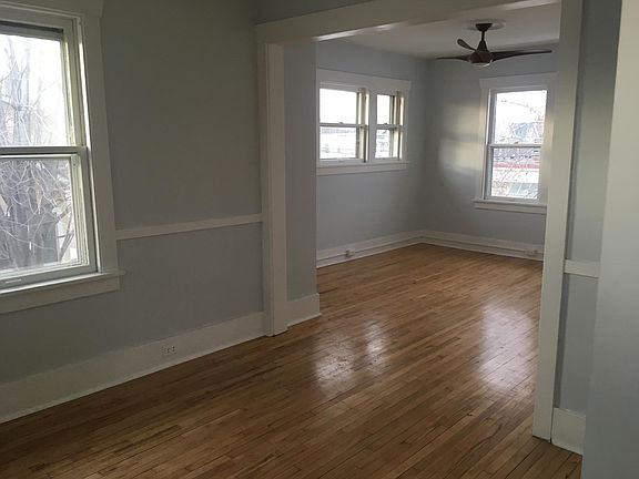 View from kitchen through to LR. Dim-able LED ceiling fan brings the cross breeze throughout the unit.