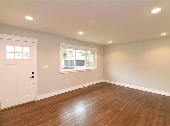ENTRY & LIVING ROOM HARDWOOD FLOORS THROUGHOUT