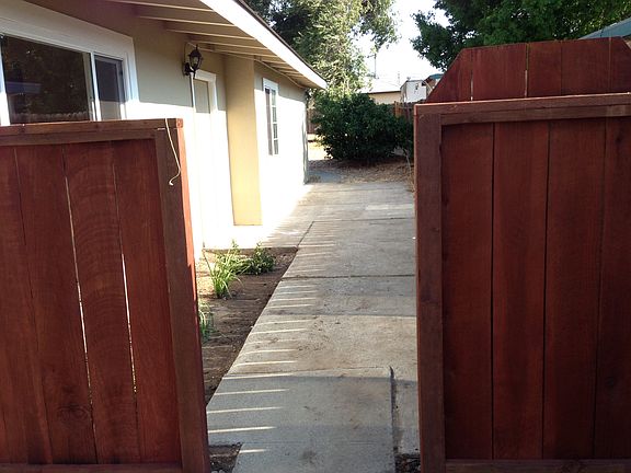 Front entrance, new fence