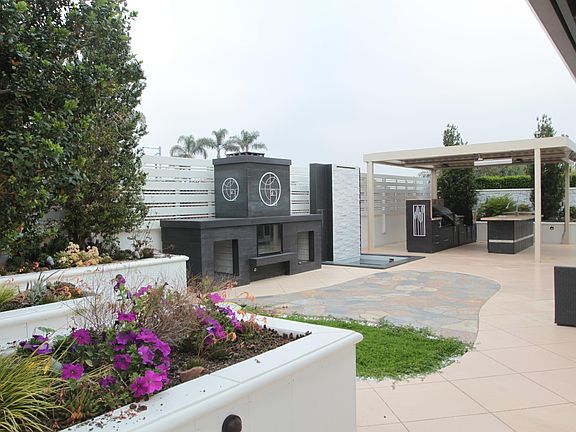 Back yard with built in BBQ