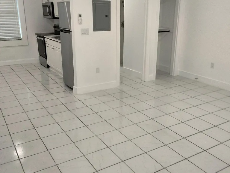 LIVING ROOM TO KITCHEN AND FULL BATH