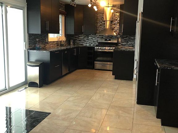 4th image of 7304 132a Ave NW