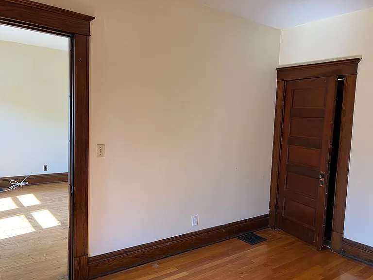 front room off of living room - view to bath hallway door