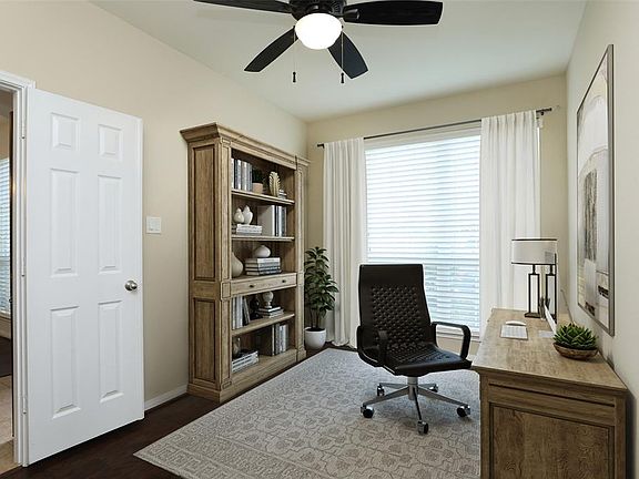 This office has been virtually staged and gives a feel for the possibilities of the furniture arrangement.
