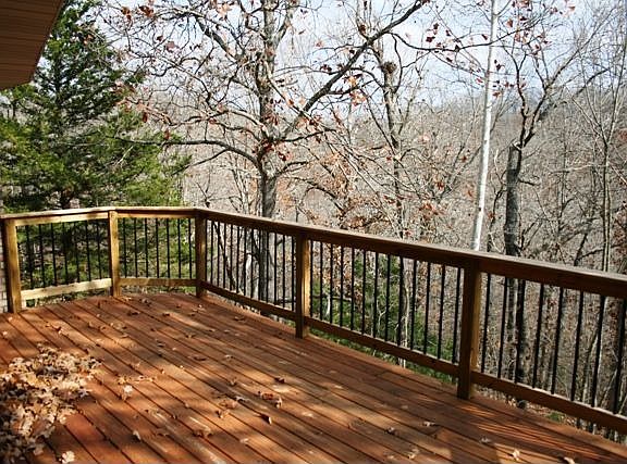 BACK DECK WITH ENTRY FR0M KITCHEN AND MASTER BATHROOM 