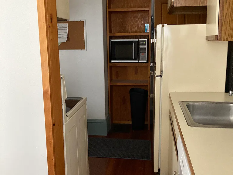 7' tall built in microwave and bookshelf 
storage shelving for all your cookbooks