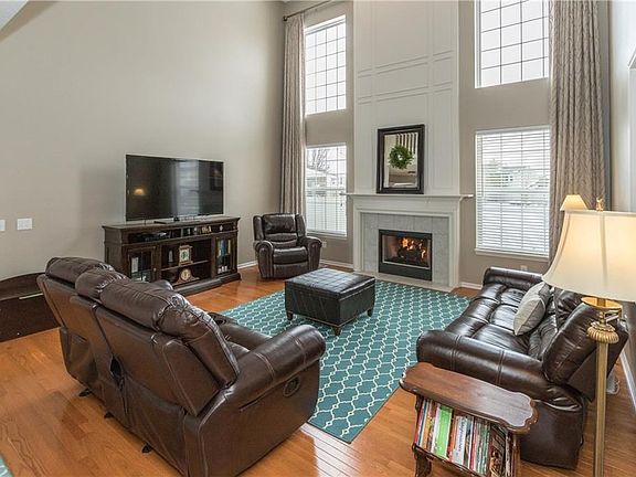 Two story great room with gas Fireplace & brand new hardwoods.