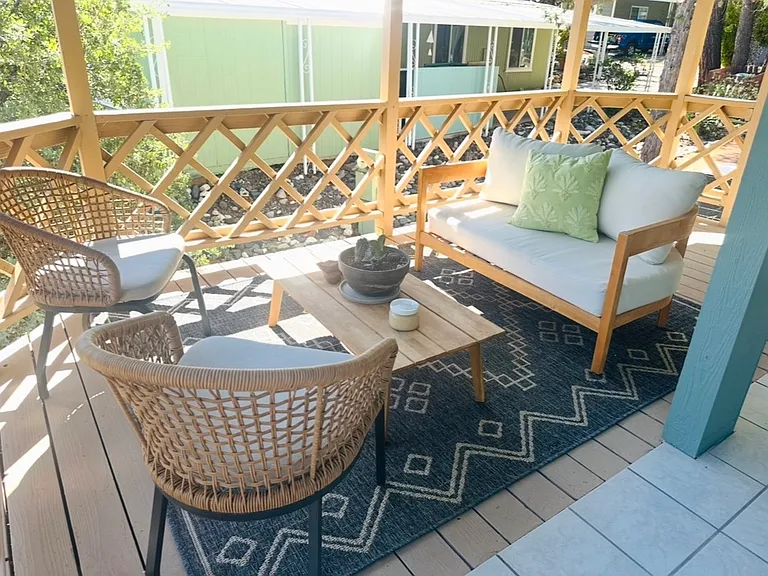 Furnished deck with party lights.