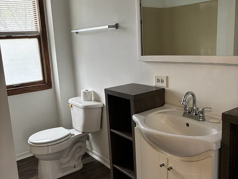 LArge Mirror in the Bathroom. Picture taken from the Area for the Stackable Washer and Dryer