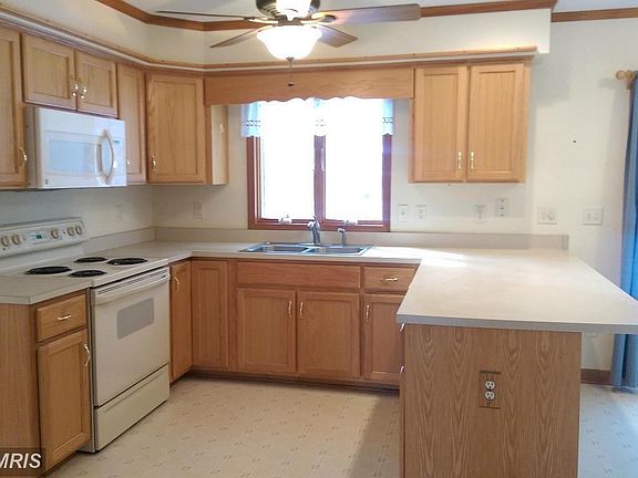 Kitchen overlooking Backyard