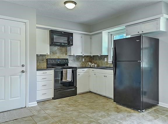 3rd image of 9812 E 52nd St