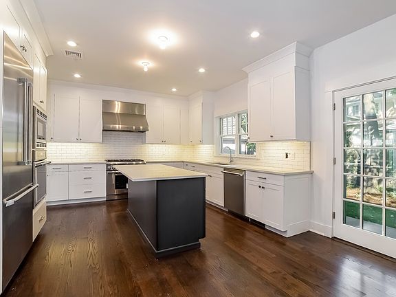 The kitchen gleams with Thermador appliances