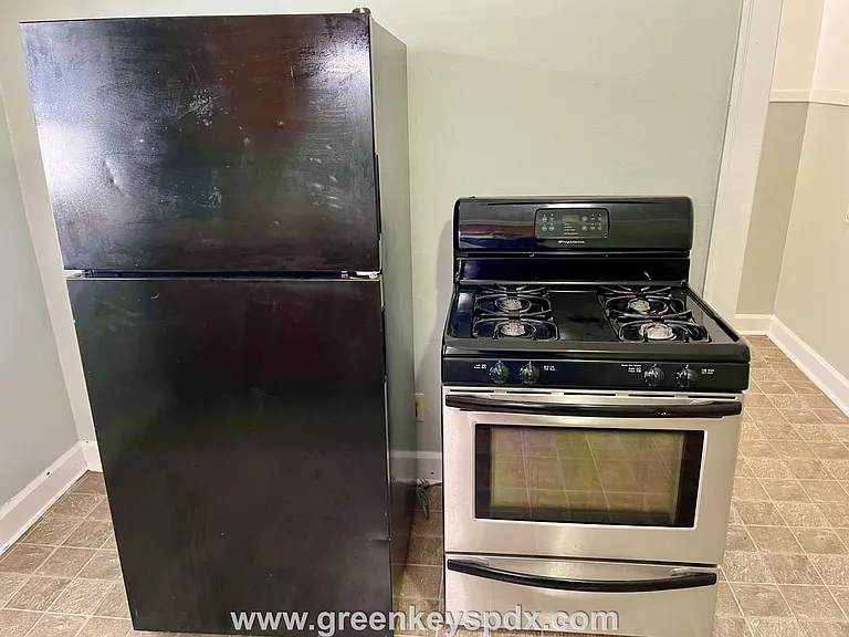 Refrigerator and gas range in 3715