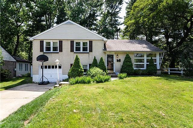 3 BR, 1.2 BA split with 1-car garage & great yard!