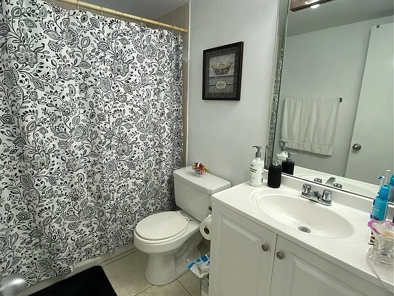 1755 W 60th St #D310 — Photo 13
