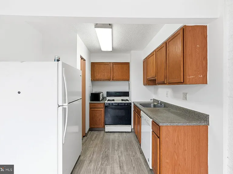 1824 Metzerott Rd #203 — Photo 11