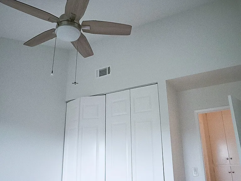 Bedroom #2 with vaulted ceilings.