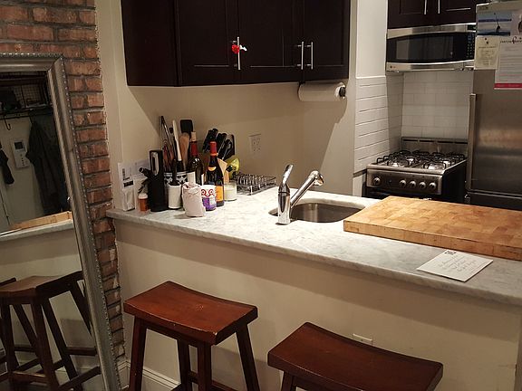 5th image of 310 W 21st St APT 1