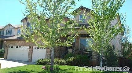 View of front of 9861 S. Flower Court
						:
						Mature trees on quiet street
