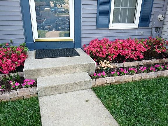 brand new stone 2-tier flower bed