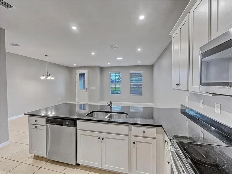 2424 Blowing Breeze Ave — Photo 10