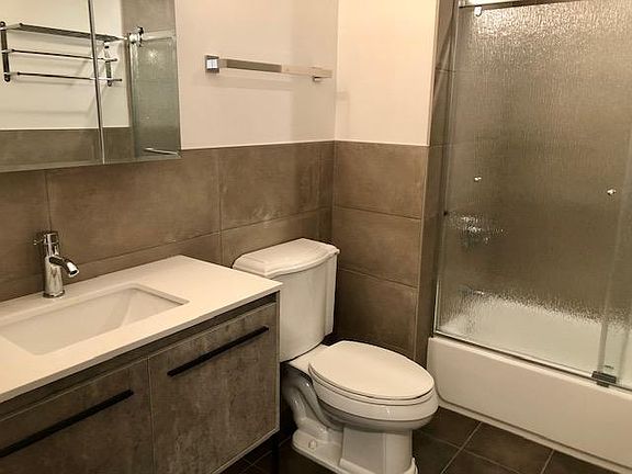 Renovated bathroom w/tub
