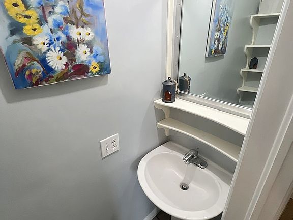small lavatory in main rental bedroom (west)