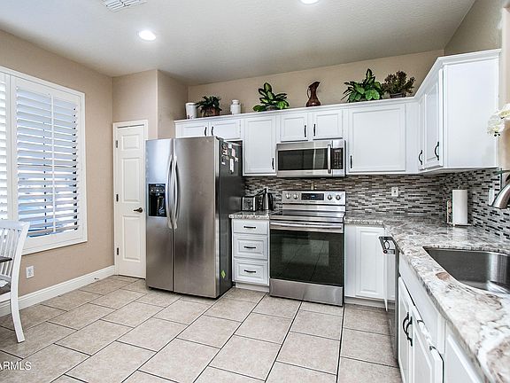 5th image of 8775 W Windsor Dr