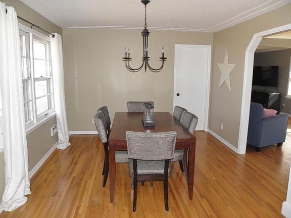 Spacious formal dining room next to kitchen.