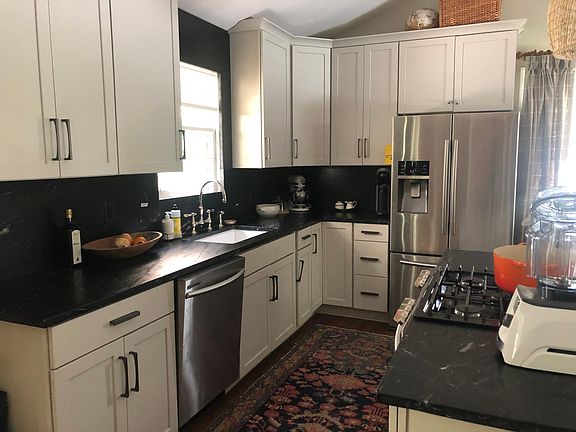 Kitchen - updated in March 2020. Soapstone counters, Shaw's ceramic sink, LED under cabinet lighting, disposal.