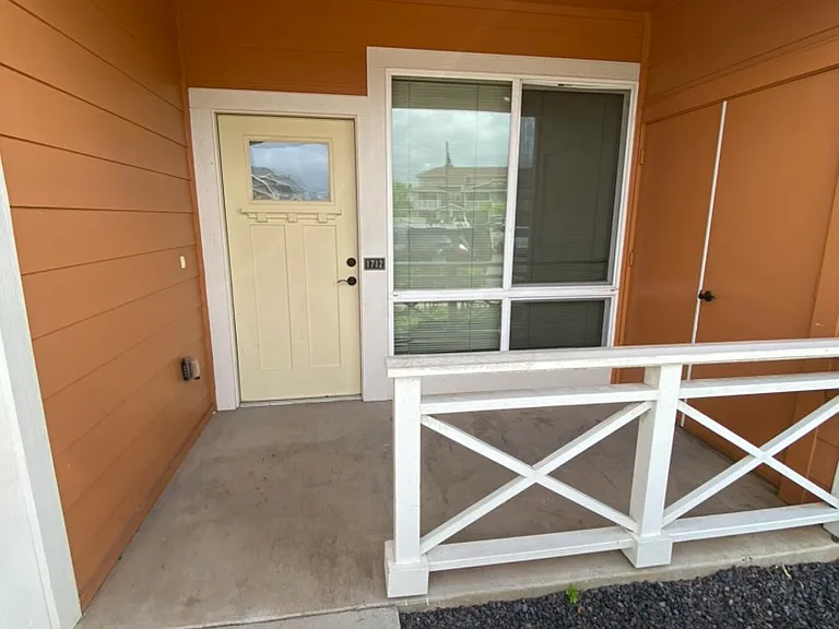 Front Door near parking stalls