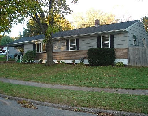 Exterior Front - Cedar shingle siding, New Roof