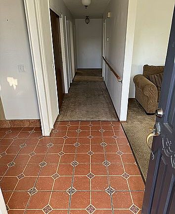 Hallway to bedrooms and bath