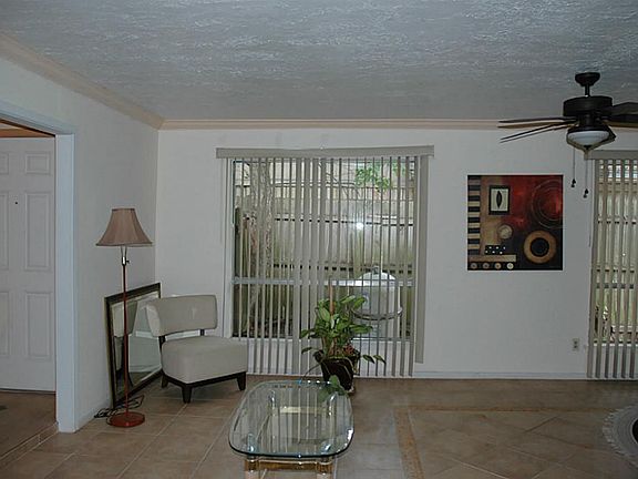 Another view of the formal living room attached to the formal dining room.