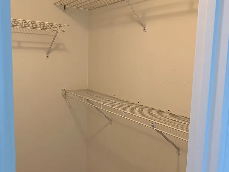 Walk in closet in master bedroom