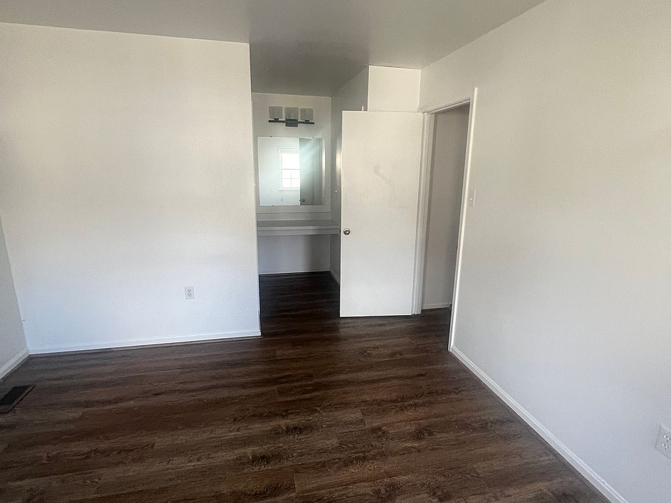 Large Primary Bedroom. King bed fits comfortably with other furniture.